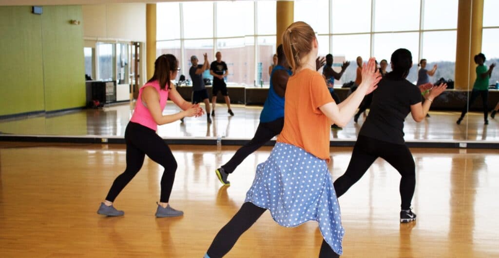 dancers in a studio learning choreography